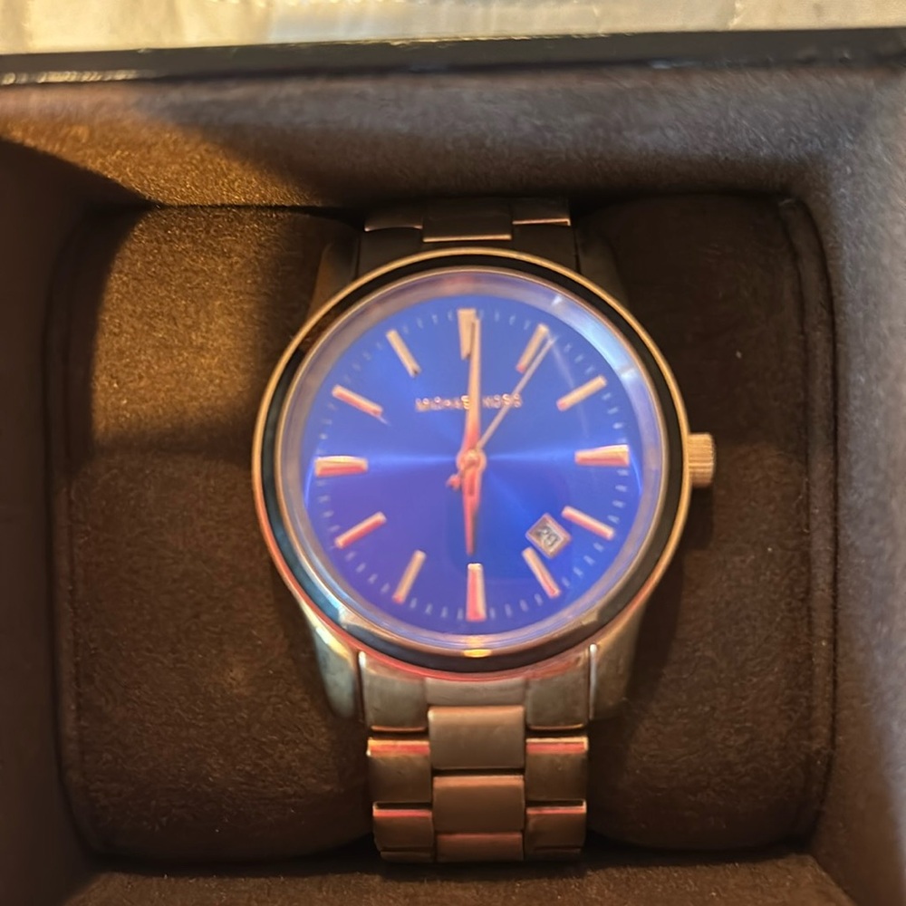 Like new Michael Kors blue and gold watch
